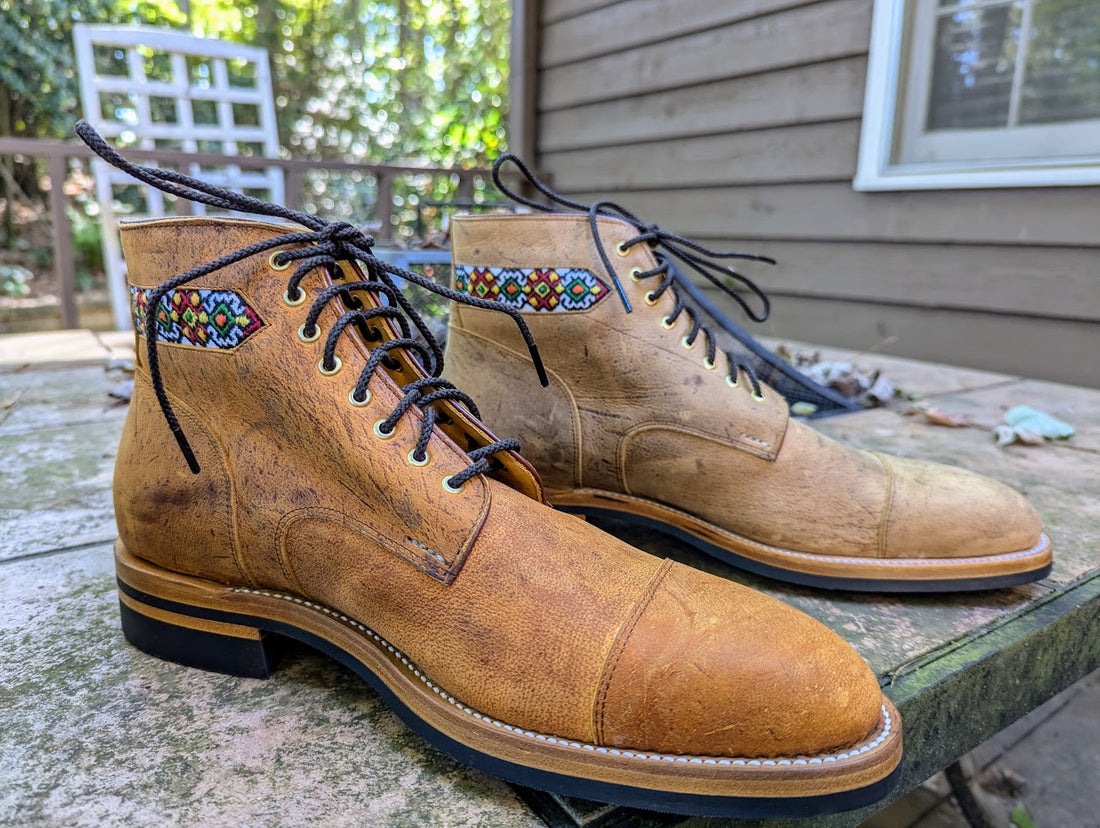 Leather boots with traditional Ukrainian embroidery inlays